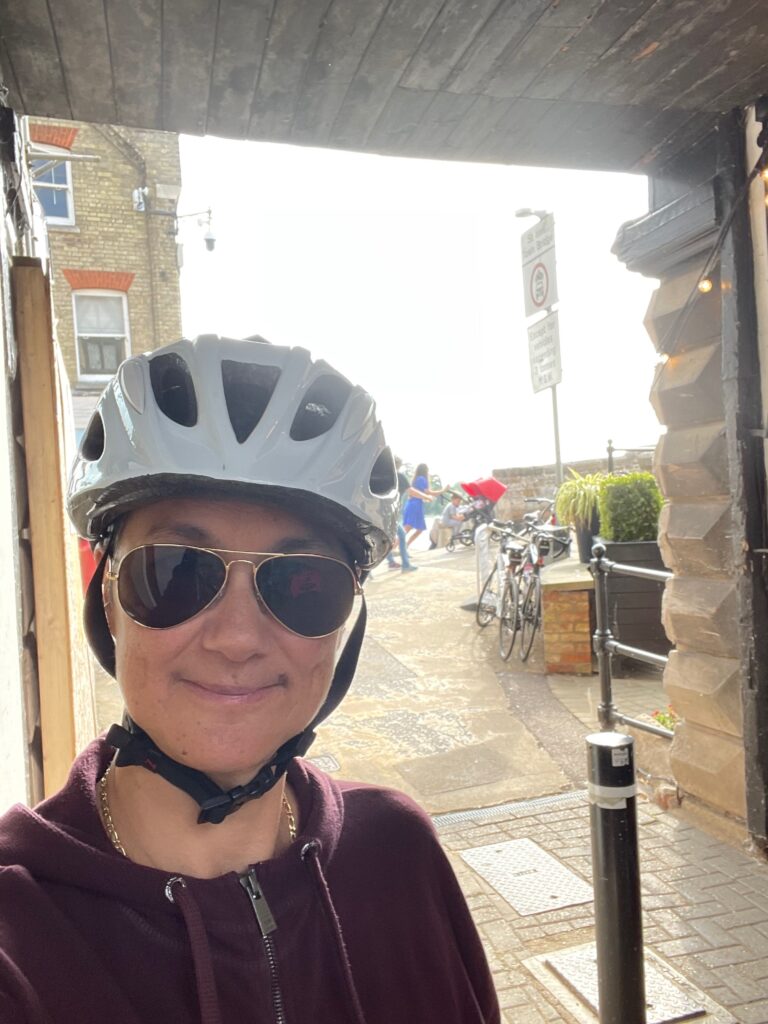 Katie in St Ives, in a cycling helmet