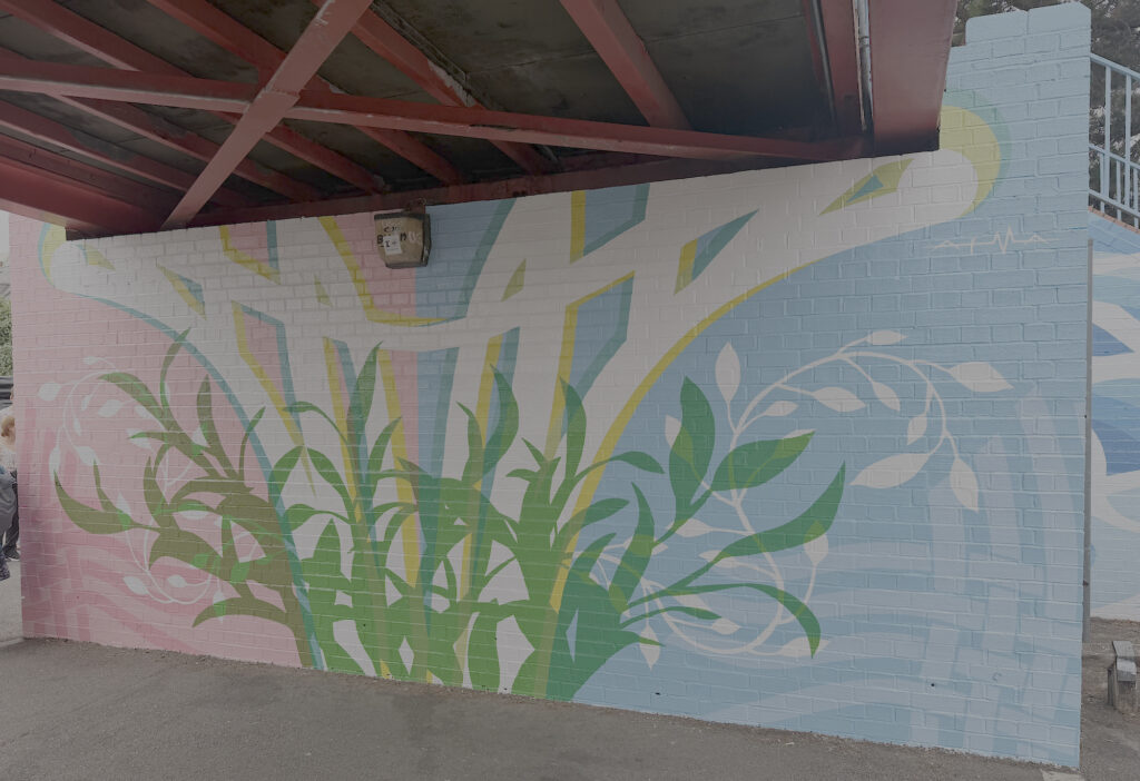 The mural at the base of the bridge